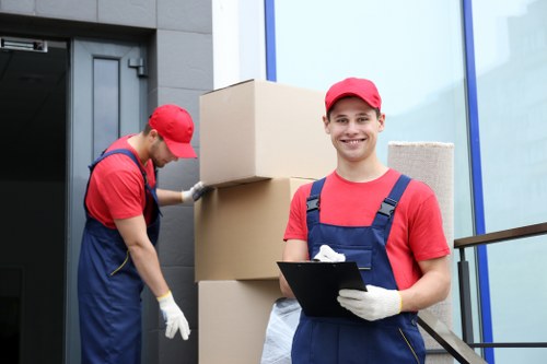 Professional movers loading household items in Tooting