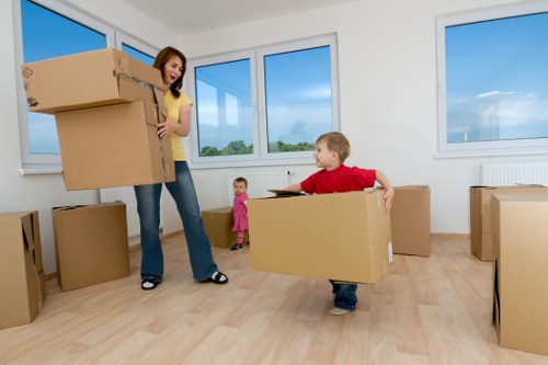Office furniture and equipment being prepared for a local commercial move