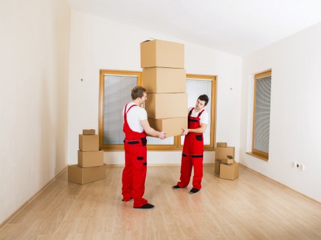 Preparing boxes and furniture for a Tooting moving truck
